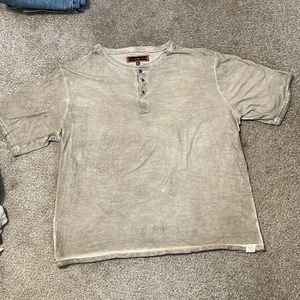 Men’s T-shirt, extra-large, short sleeve with three buttons down the front.